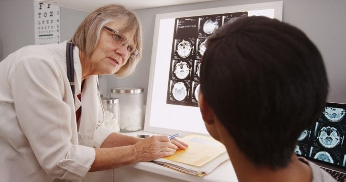 Doctor speaking to stroke patient