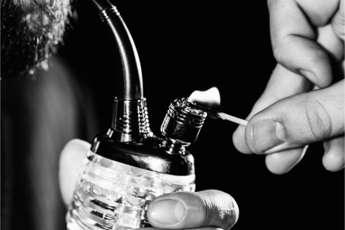 migraine pain prevented for man smoking a tiny bong