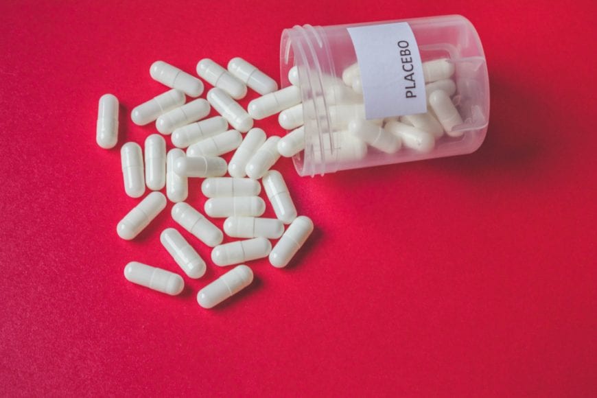 Spilled placebo pills suggesting double blind placebo tests
