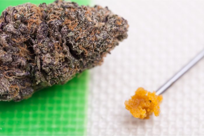 dab nail beside cannabis bud