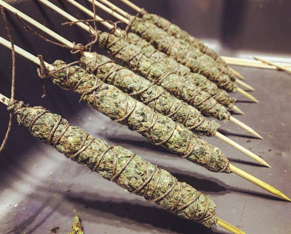 cannabis cigar represented by a line up of cannabis cigars curing