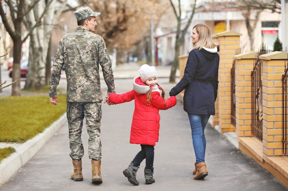 vet walking with family