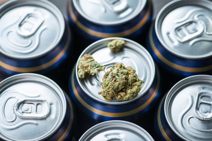 cannabis drink represented buy beer can with cannabis bud on top