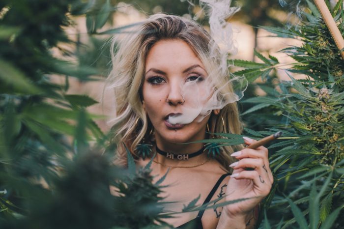 attractive woman smoking cannabis