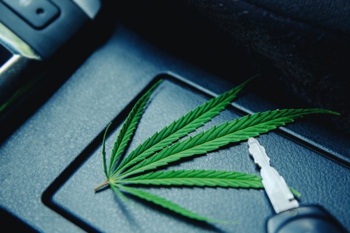 THC DUI LEVELS suggested by car key and cannabis leaf