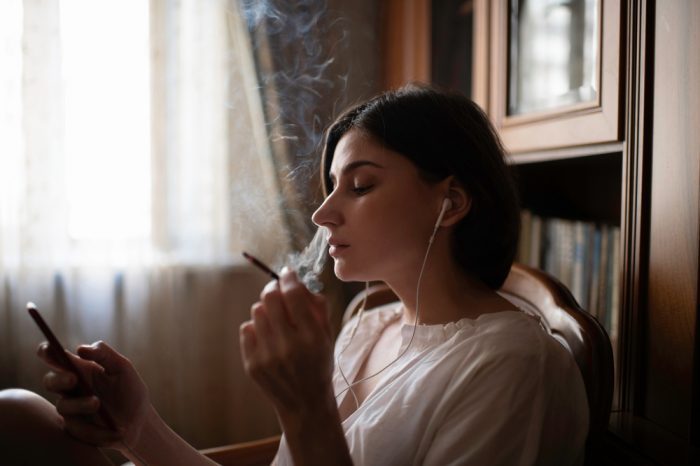 girl using cannabis perhaps to avoid saying "I want to die"