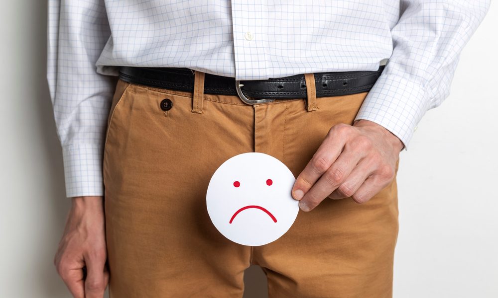 bladder cancer symptoms represented by unhappy man 